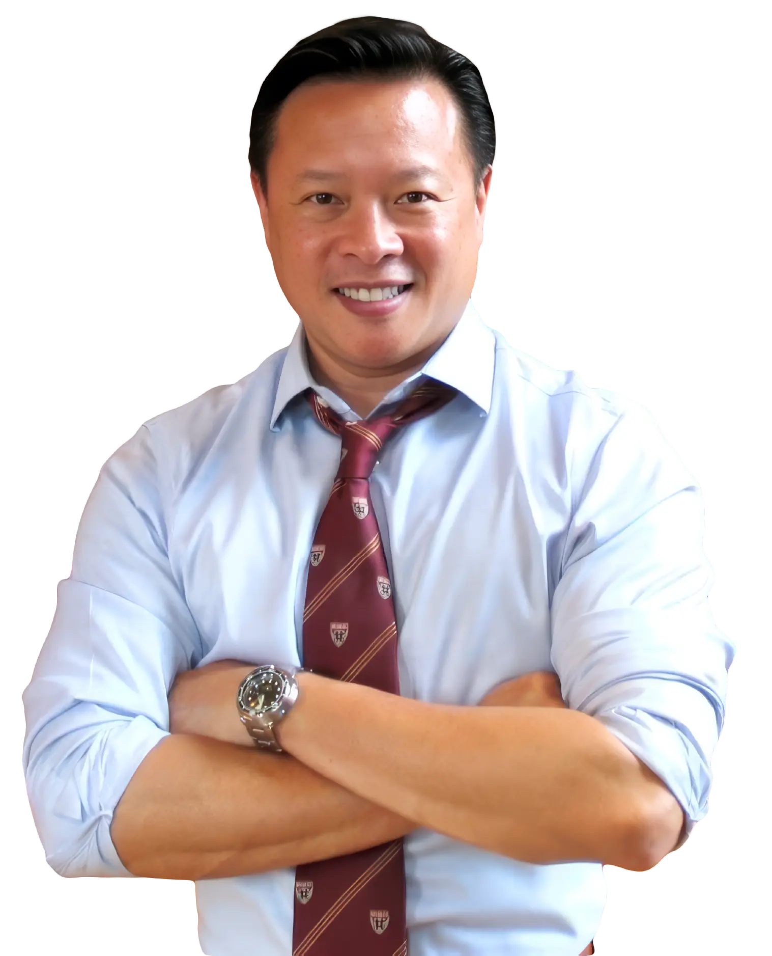 Nick Tran with his arms folded and smiling.
